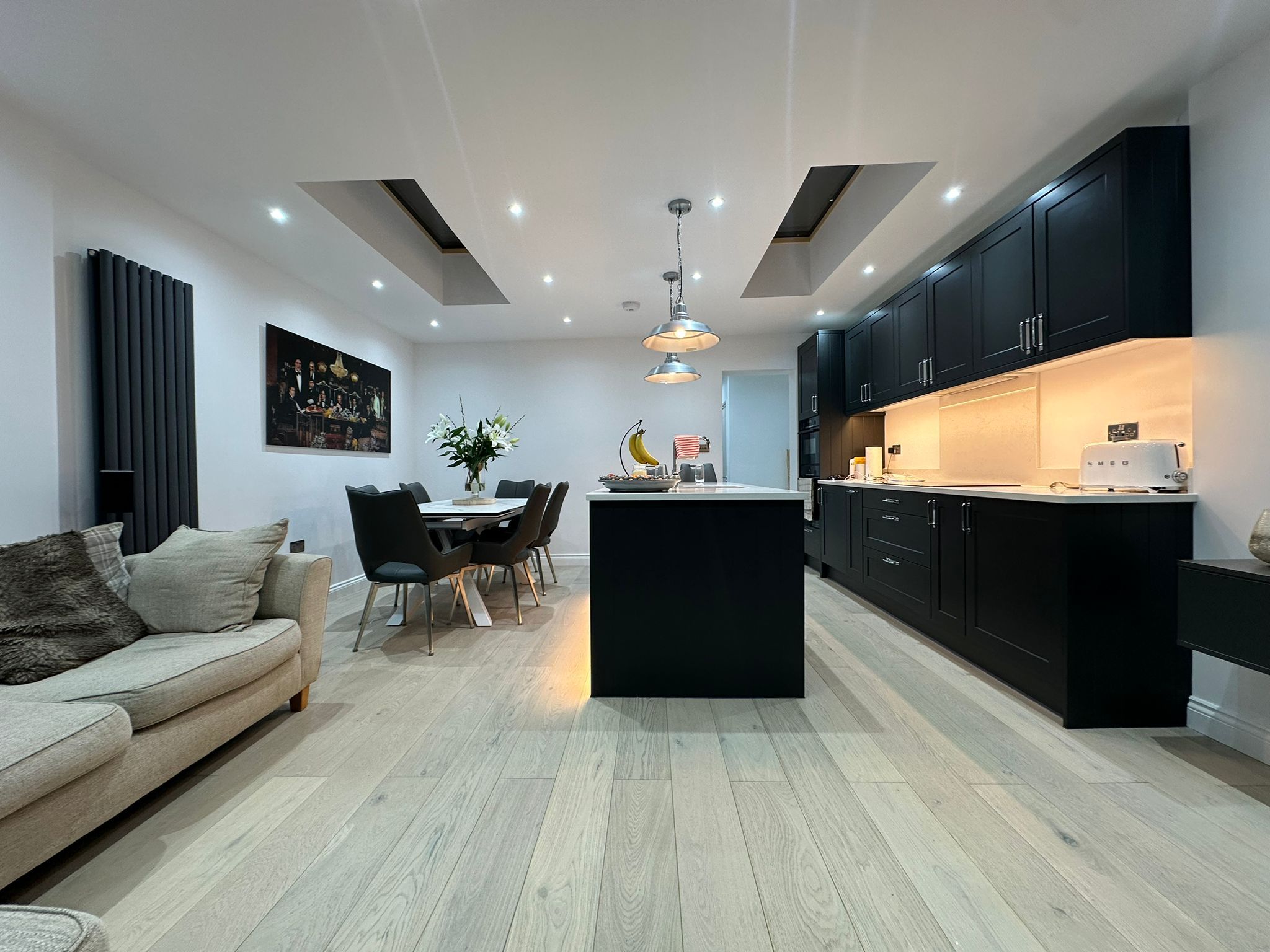 Completed rear extension kitchen-diner with skylights in Leyton by JFA Construction Group